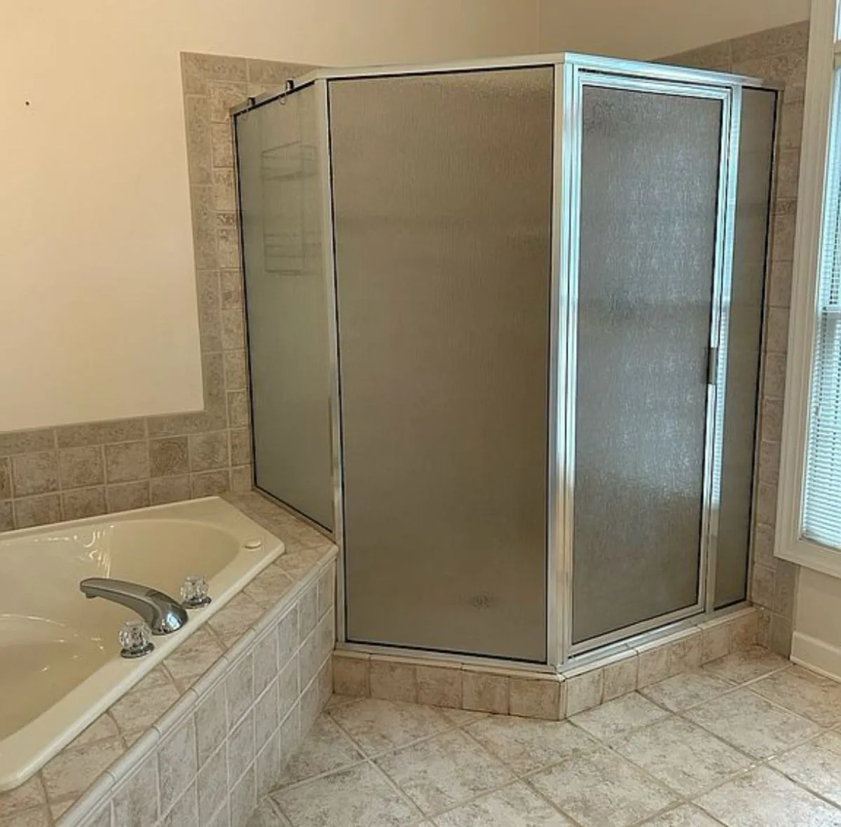 Cramped bathroom layout with linoleum flooring – before renovation in Virginia Beach