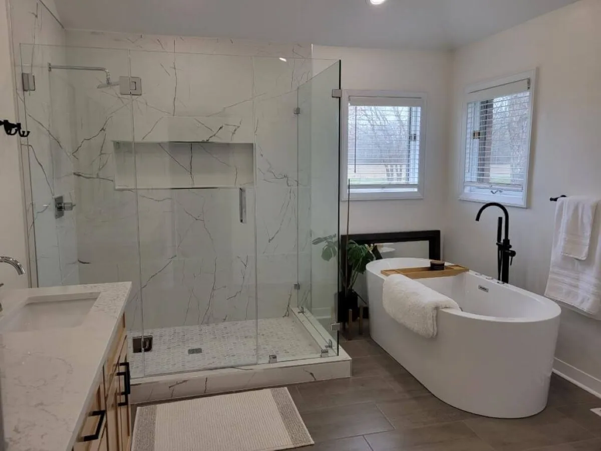 Spacious bathroom with freestanding tub and dual shower in Chesapeake