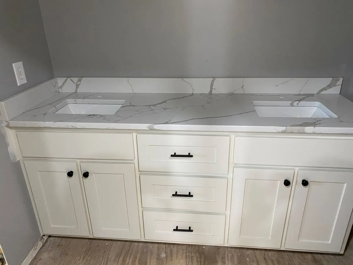 L-shaped cabinetry layout with large drawers and modern finishes